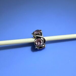 Chamilia retired sterling silver Forever bead with light pink CZ stones.